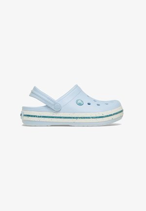 Light blue clog with a closed toe, ventilation holes, and adjustable heel strap. Features a white speckled sole with turquoise accents.