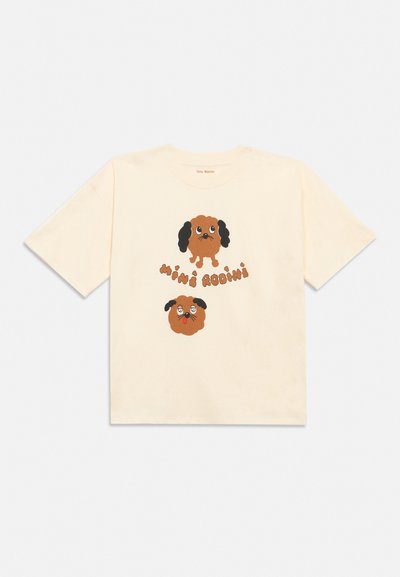 Camiseta de manga corta color crema con dos caras de perro marrón en estilo dibujos animados y el texto "Mini Rodini" en letras burbujeantes entre ellas.