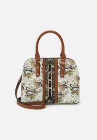 White handbag with decorative animal print, brown leather handles, and a black central stripe featuring a gold chain accent. Adjustable strap.