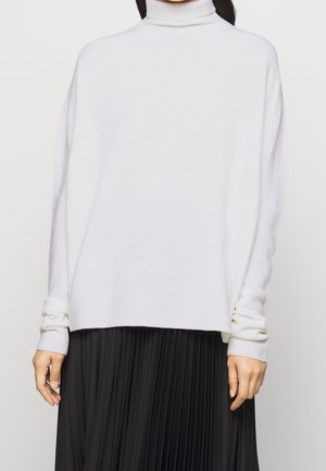 Stickad tröja - off-white
