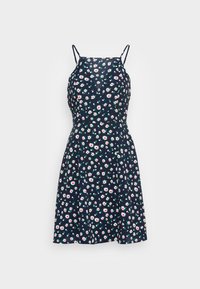 Námořnická modrá šaty bez rukávů s tenkými ramínky, zdobené bílým a červeným květinovým vzorem kopretin a přiléhavým korzetem s rozevlátou suknią.