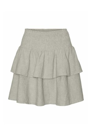 Jupe tiered en lin gris clair avec une taille smockée et deux couches volantes pour plus de volume et de texture.