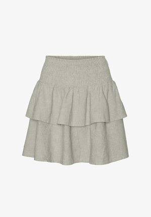 Jupe tiered en lin gris clair avec une taille smockée et deux couches volantes pour plus de volume et de texture.