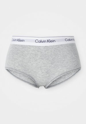 Gray cotton brief with a soft texture, featuring a white waistband embossed with "Calvin Klein" in blue lettering.