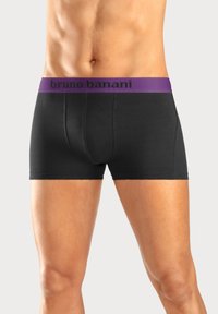 Svarta boxerkalsonger med mjuk textur, med en lila midjeband märkt "bruno banani," designade för en snug fit.