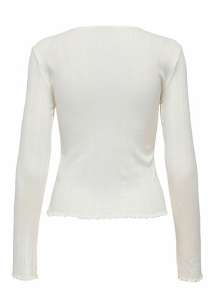 Långärmad topp i off-white ribbad tyg med texturerade vertikala ränder och vågig fåll. Har en figurnära silhuett och rundad halsringning.