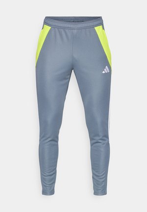 TIRO TRAINING PANT REGULAR - Teplákové kalhoty - team onix/team semi sol yellow