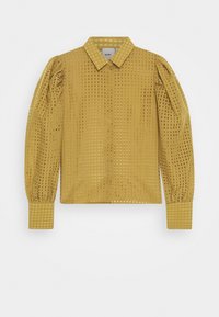 Blouse jaune texturée avec motif à carreaux, col pointu et manches longues bouffantes, présentant des poignets boutonnés et une coupe décontractée.
