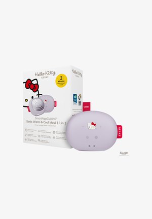 Appareil pour masque facial chaud et froid sonic violet sur le thème Hello Kitty à côté de sa boîte d’emballage blanche avec détails du produit et logos.