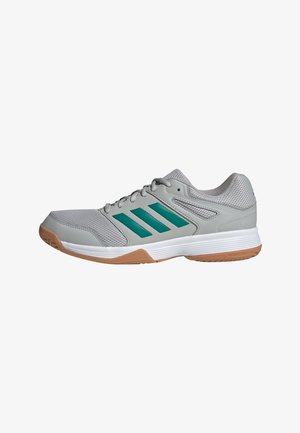 Grauer Sportschuh mit türkisen Streifen, weißer Zwischensohle und Gummiaußensohle, mit Obermaterial aus Mesh und synthetischen Materialien.