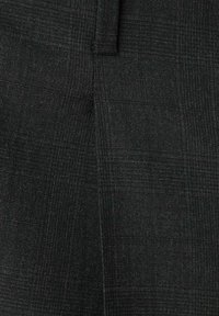 Black tailored trousers with a subtle check pattern. Made of textured fabric featuring straight lines and a smooth finish.