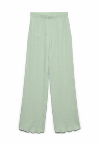 Ljusgröna vida byxor i en strukturerad tyg, med elastisk midja och scallopdetaljer i nederkant.