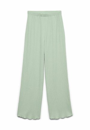 Lichtgroene wijde broek met een textuurstof, elastische tailleband en golvende zoomafwerking.
