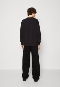 Levi's® Gold Tab CREW - Sportska majica - black agate