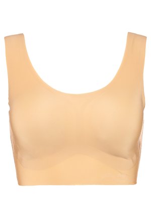 Beiger, kabelloser BH mit breiten Trägern, nahtlosem Design, glatter Textur und leicht geschwungenem Ausschnitt. Dezentes Logo der Marke an der Seite.