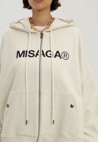 Misaga STATEMENT HOODIE - Sweater met rits - beżowy