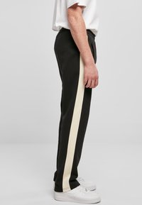 Urban Classics Pantaloni de trening - black