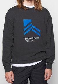 Han Kjøbenhavn Mikina - black