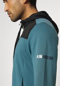 Mizuno ATHLETIC JACKET - Camisola com fecho - tapestry