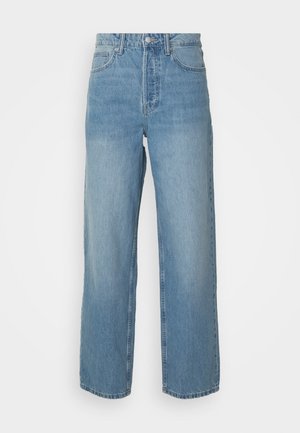 Lyseblå denimjeans med høy midje, vide ben og en subtil falmet tekstur. Har frontlommer og glidelås-lukking.