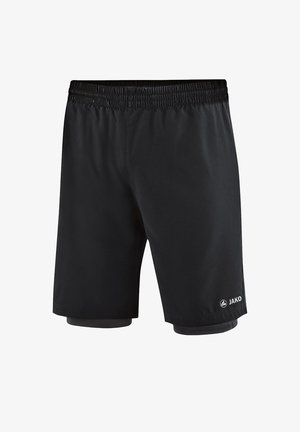 Pantalones cortos deportivos negros con una cintura elástica, con una textura suave y el logo de Jako en la parte inferior derecha. Capa interior visible.