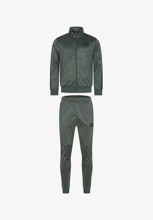 Tracksuit i mørkegrøn, lavet af glat, let materiale. Lynlåsjakke med høj krave og matchende tætsiddende bukser med elastisk talje.