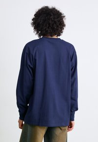 Carhartt WIP AMERICAN SCRIPT - Langarmshirt - air force blue