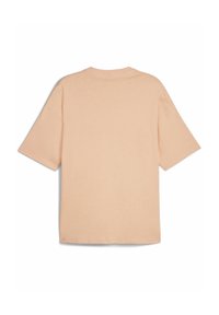 Kortærmet t-shirt med rund hals i lys ferskenfarvet bomuld. Har en afslappet pasform med en glat tekstur og et minimalistisk design.