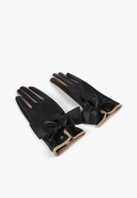 Black leather gloves with a beige trim and a large bow accent at the wrist, featuring five fingers and a smooth texture.