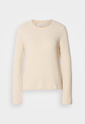Cream-colored, long-sleeve sweater made of textured fabric with a round neckline, featuring a soft, fuzzy finish and a relaxed fit.