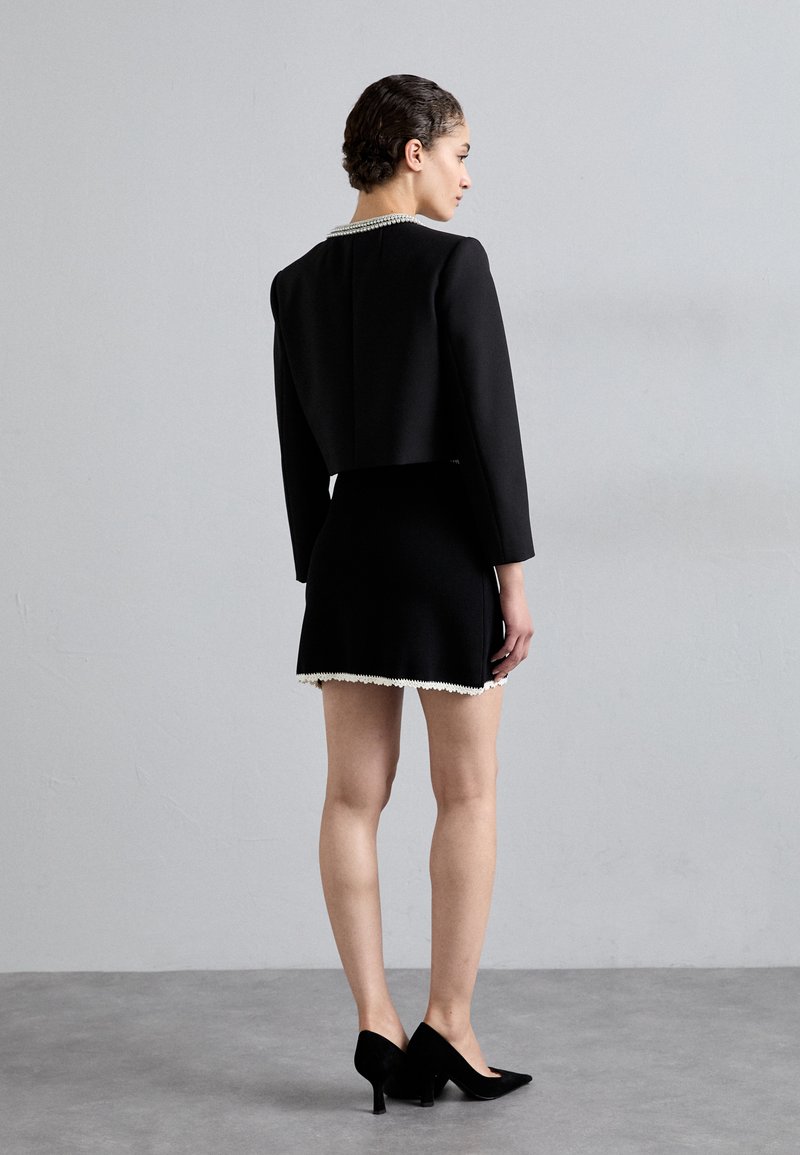 Jupe Femme Scoop - Linen Noir Avec Bordure Blanche - Taille Petite (4-6) - Occasion En Bon état
