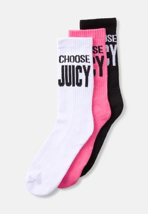 Trois paires de chaussettes de sport : blanche, rose et noire. Chacune présente un texte noir en gras, "CHOISIS JUTEUX," sur le devant. En mélange de coton.