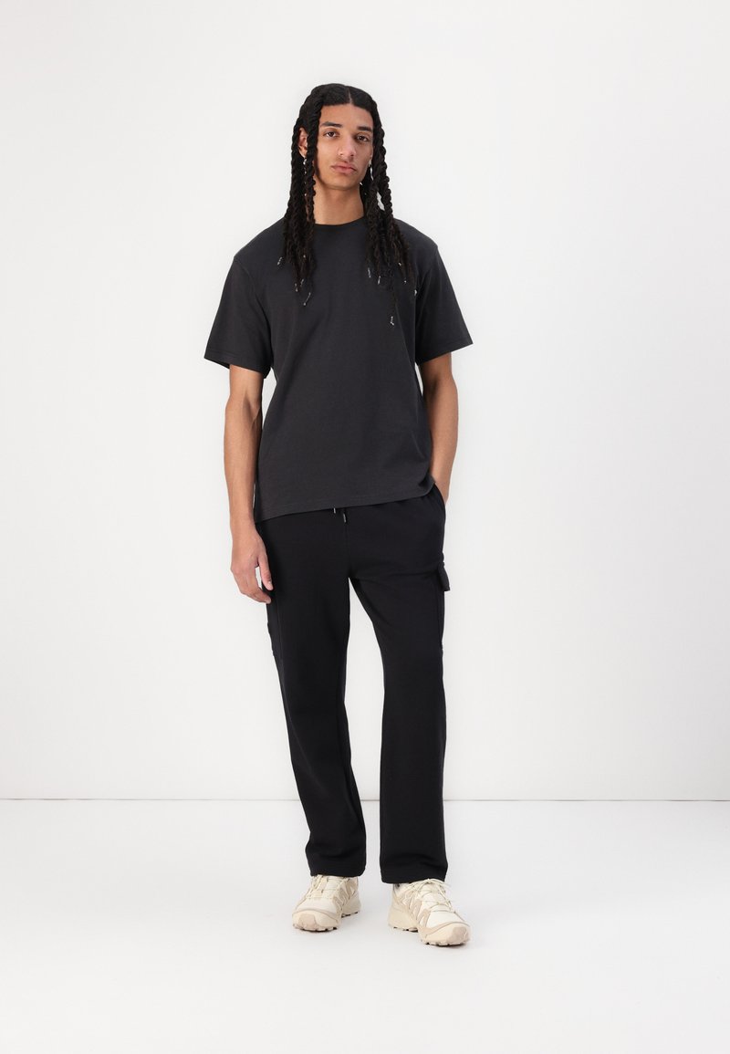 The North Face M CARGO JOGGER - Teplákové kalhoty - black
