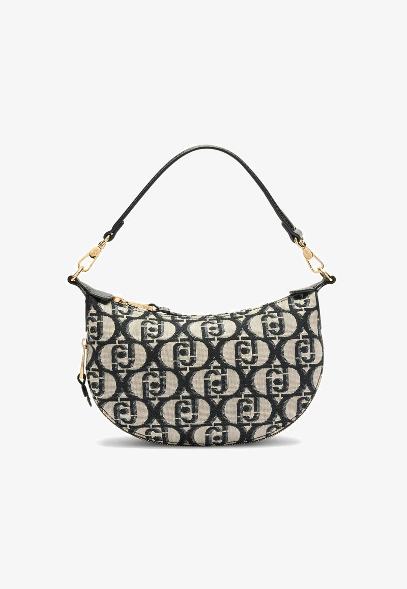 Borsa in tessuto con trama, caratterizzata da uno sfondo beige con motivi circolari neri, una forma curva e una tracolla nera con dettagli in metallo dorato.