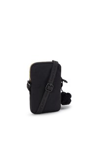 Borsa a tracolla nera in nylon con chiusura a zip, caratterizzata da una tracolla texturizzata e un accento con pom-pom. Forma rettangolare, dimensioni compatte.