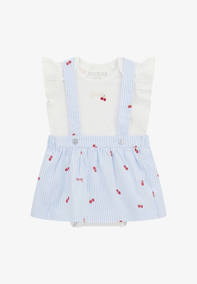 Top in cotone bianco con maniche a volant, gonna a righe blu e bianche con stampa di ciliegie, spalline regolabili e chiusura a pressione sul fondo.