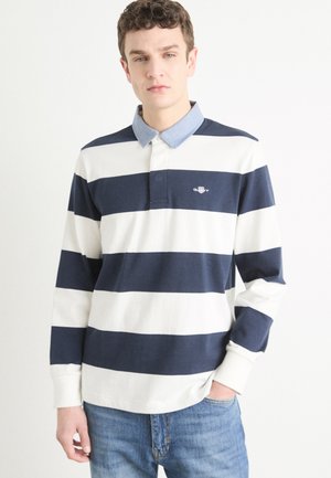 Langärmliges Polohemd mit navy-blauen und weißen horizontale Streifen, jeansähnlichem Kragen, gesticktem Logo, weichem Baumwollmaterial und lässigem Schnitt.
