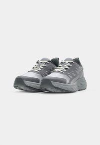 Gray athletic shoes with a mesh upper, rubber sole, and textured accents. Features molded heel and contrasting laces. Lightweight design.