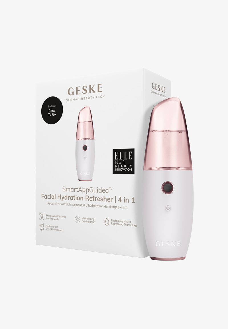 Facial hydration refresher in white and rose gold. Features a sleek, tapered design with a central button and water chamber, packaged in a box.