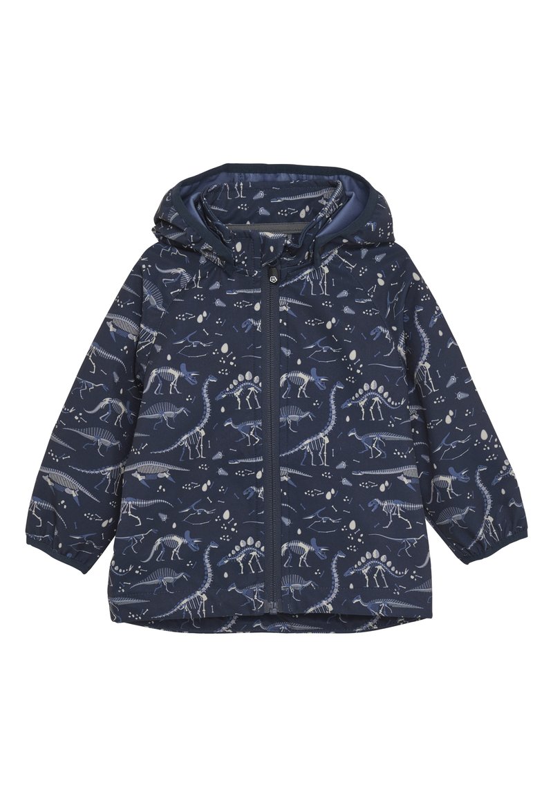 Marinblå regnjacka med mönster av dinosaurieskelett, utrustad med huva, framdragkedja och elastiska ärmslut. Slät textur, lätt material.