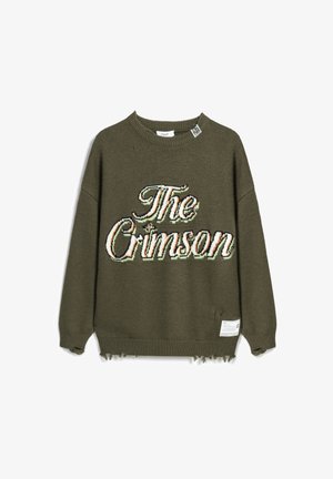 Olive green knitted sweater with a round neck, featuring a multicolored embroidered text "The Crimson" and frayed hem details.