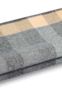 Szaro-żółta wełniana tkanina w kratę, charakteryzująca się miękką fakturą, wyraźnymi wzorami oraz odwracalnym wzornictwem w różnych odcieniach szarości.