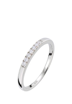 Sterling silver ring with a row of seven round clear gemstones set on the band, marked "925" inside.