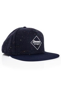 Dunkelblaues Baseballcap mit gesprenkelter Textur, flachem Schirm und einem weißen, rhombusförmigen Logo mit der Aufschrift "Blacksmith" in der Mitte.