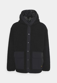 Marineblaue Fleecejacke mit Kapuze, Druckknöpfen und zwei großen Fronttaschen; Innenausstattung mit gesteppter, glänzender Fütterung.