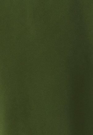 Tamsiai žalia tekstūruota medžiaga su lygiu, matinio paviršiaus apdaila. Nėra matomų raštų ar metalinių detalių, akcentuojanti vientisą, homogenišką išvaizdą.