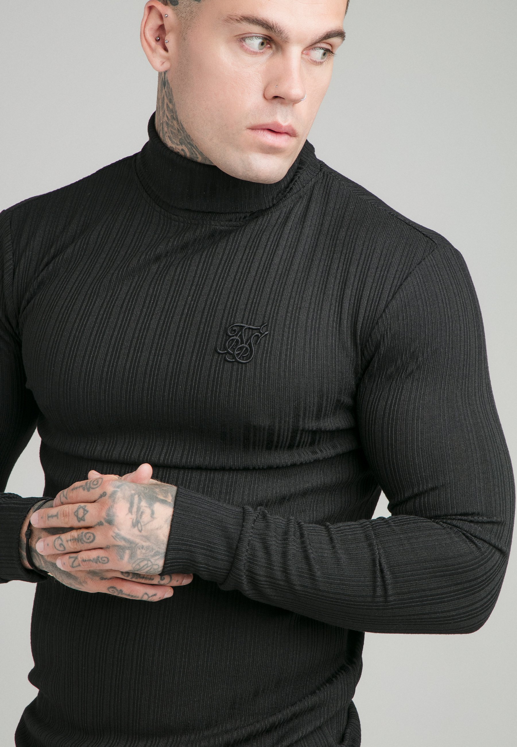 black ribbed polo neck