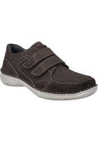 Brown suede shoe with two Velcro straps, white stitching, rounded toe, and a textured upper. Soft sole provides comfort and support.