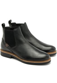 Czarne skórzane botki kostkowe z elastycznymi bocznymi panelami, okrągłym noskiem i teksturowaną powierzchnią. Posiadają brązowy, warstwowy obcas oraz dekoracyjne akcenty.