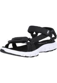 Black sandal featuring adjustable straps, a cushioned black footbed, and a white rubber sole with textured grooves for grip.